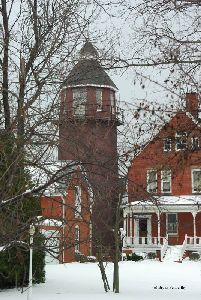 Tower, carriage house, and dwelling.