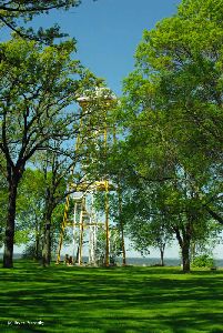 The tower stands in the park.