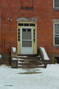 Door to the dwelling.