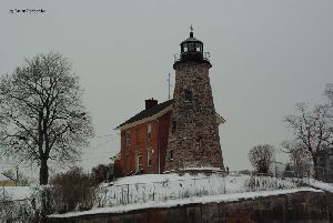 The lighthouse on the hill.