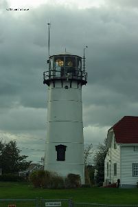 The tower, with both lights shining.