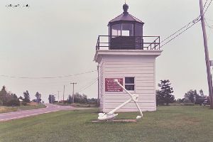 Looking at the lighthouse and anchor.