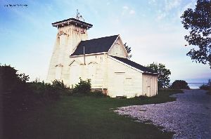 Dusk sets in at Prince Edward Point light.