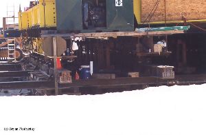 DURING MOVE: Steel pilings hold up the tower.