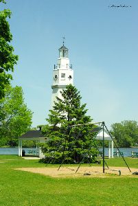 Swing sets by the lighthouse.