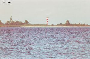 Distance shot of the lighthouse from across the channel.