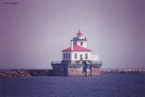 The Oswego West Pierhead lighthouse out on the breakwall.