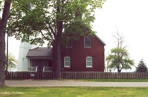 The lighthouse and keeper