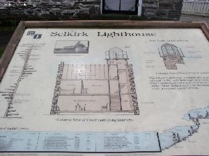 Sign by the lighthouse.