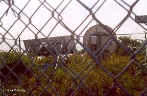 Satellite dish and solar panels.